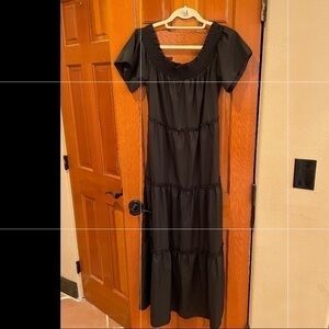 Black off the shoulder ruffle maxi dress